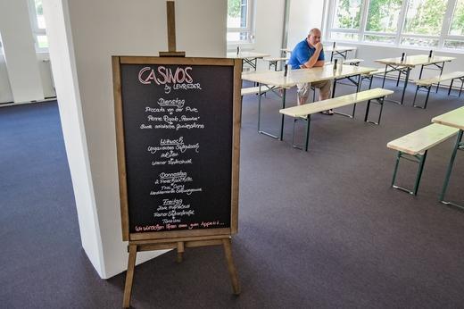 Our sysadmin Aurelio waiting for the official opening of the Paessler cafeteria.